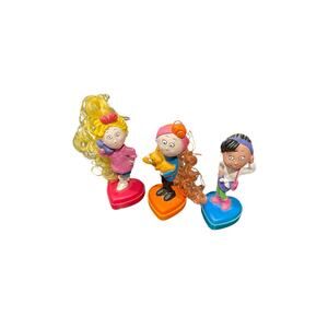 3 vintage girl stamps with blonde, brunette, and red curls